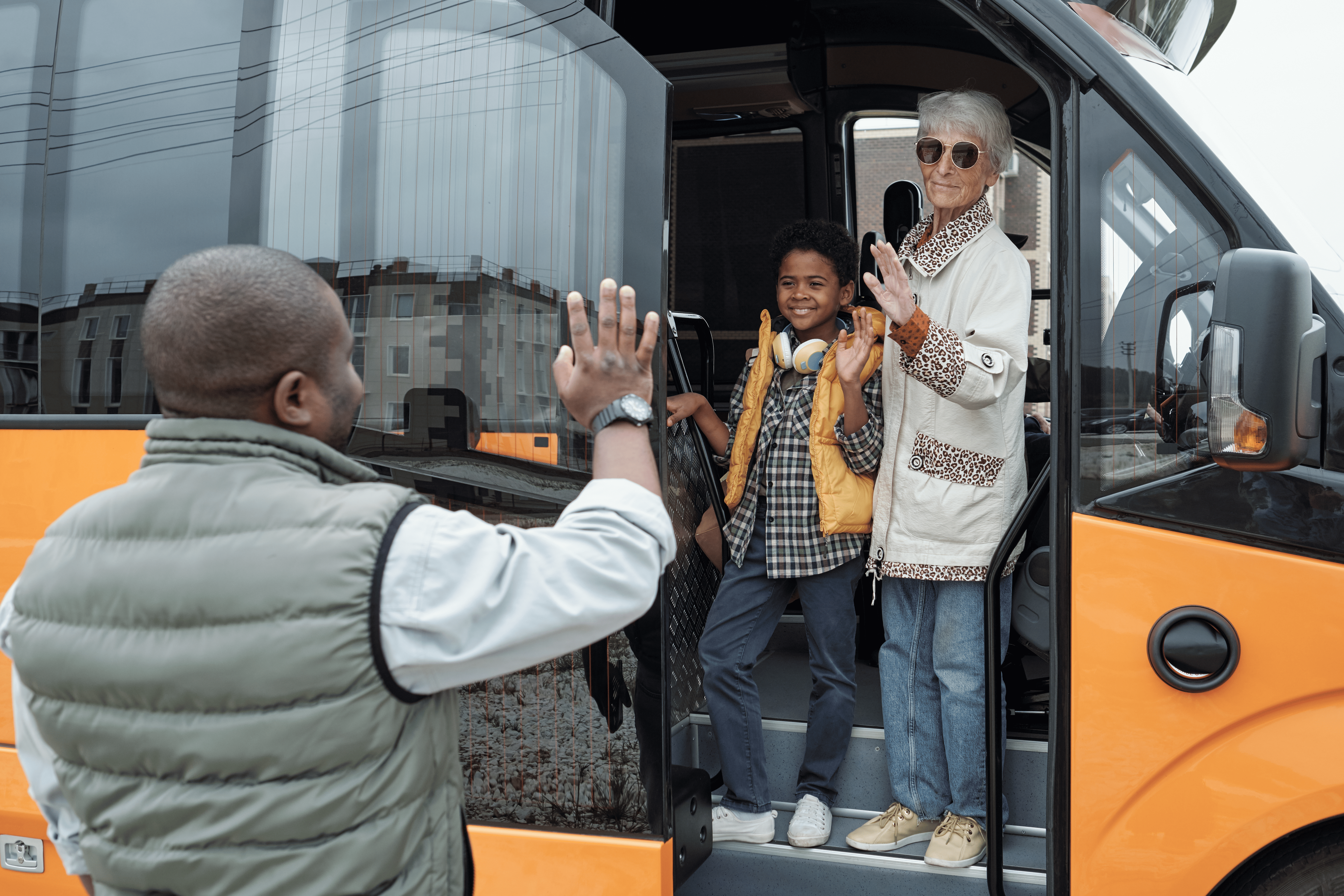 Students boarding a safe school taxi near Manchester Airport